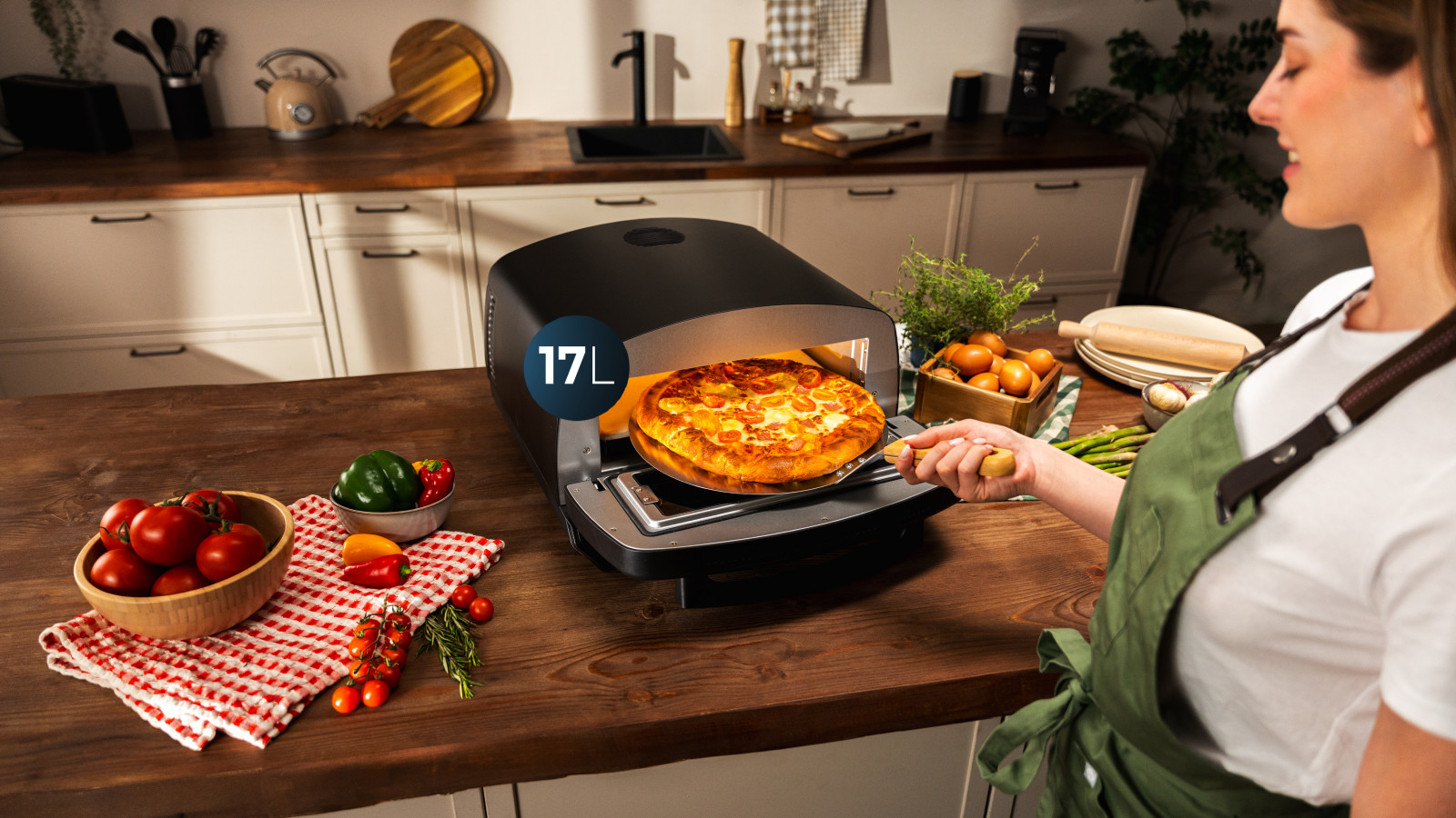 Calentamiento y capacidad: doble resistencia de 2200W (1300W arriba y 900W abajo) para una cocción equilibrada, con capacidad de 17 litros, ideal para pizzas de hasta 13 pulgadas.