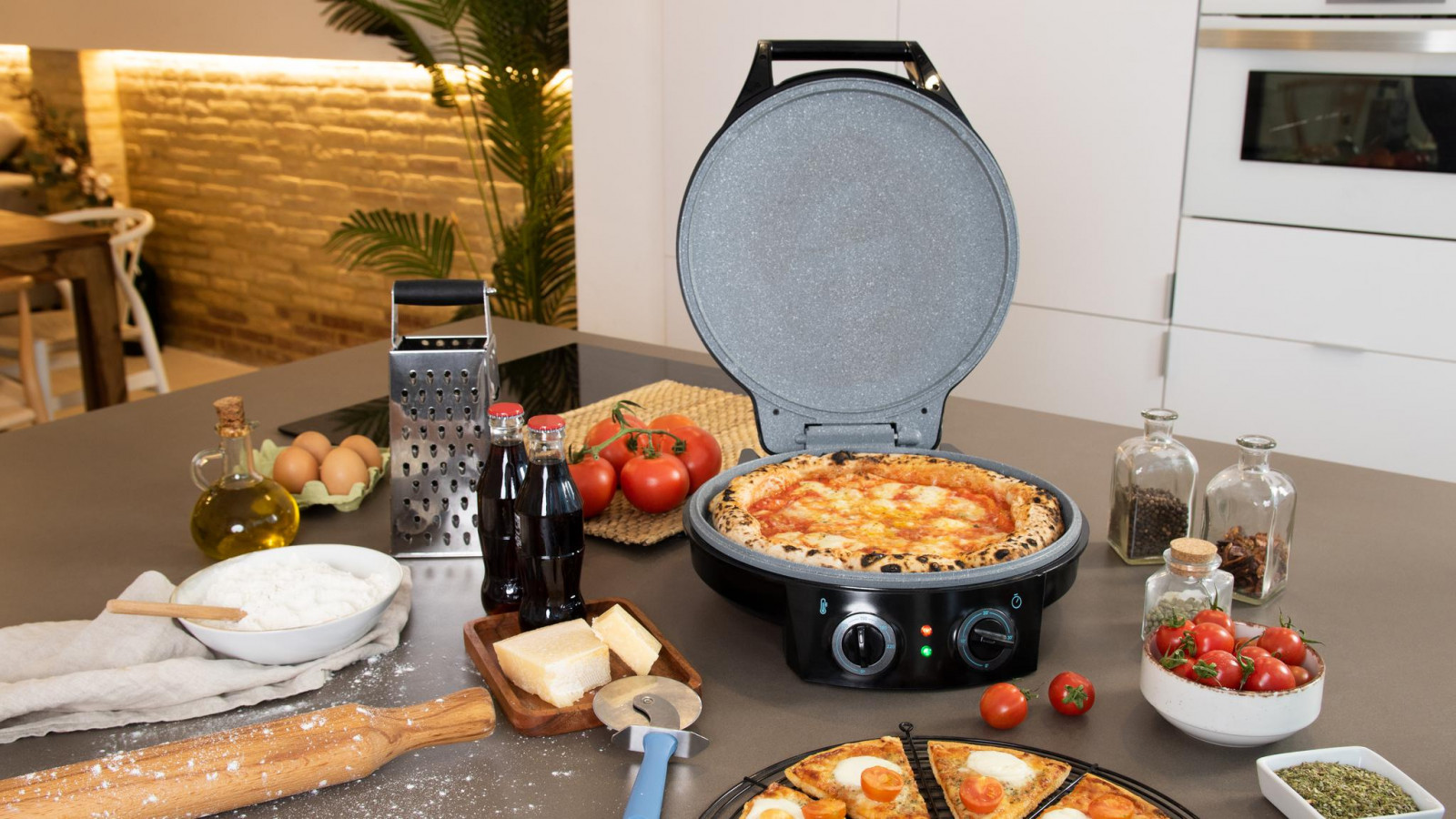 Horno eléctrico para pizzas de 1800 W de potencia para preparar pizzas profesionales.