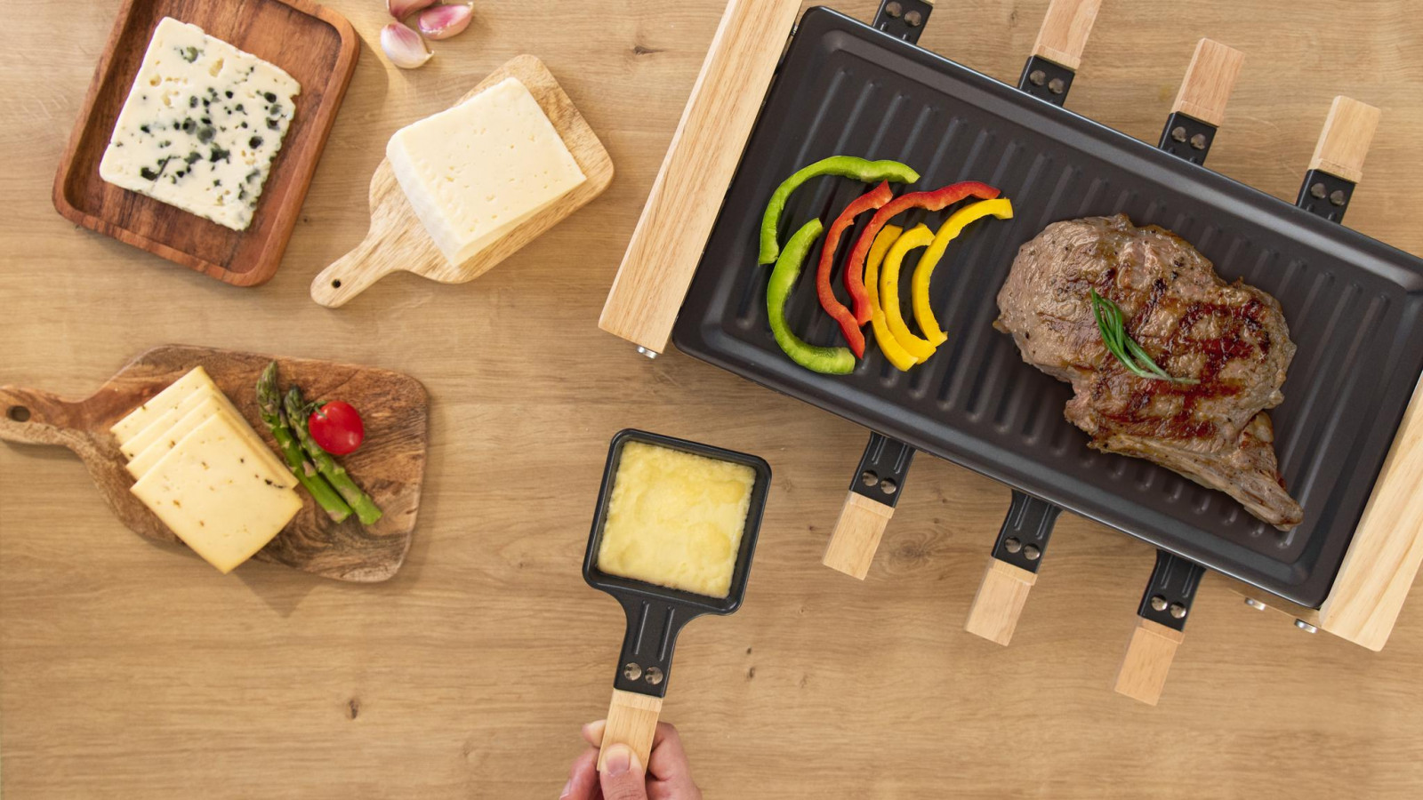 Raclette de 1200 W, ideal para asar y hornear.