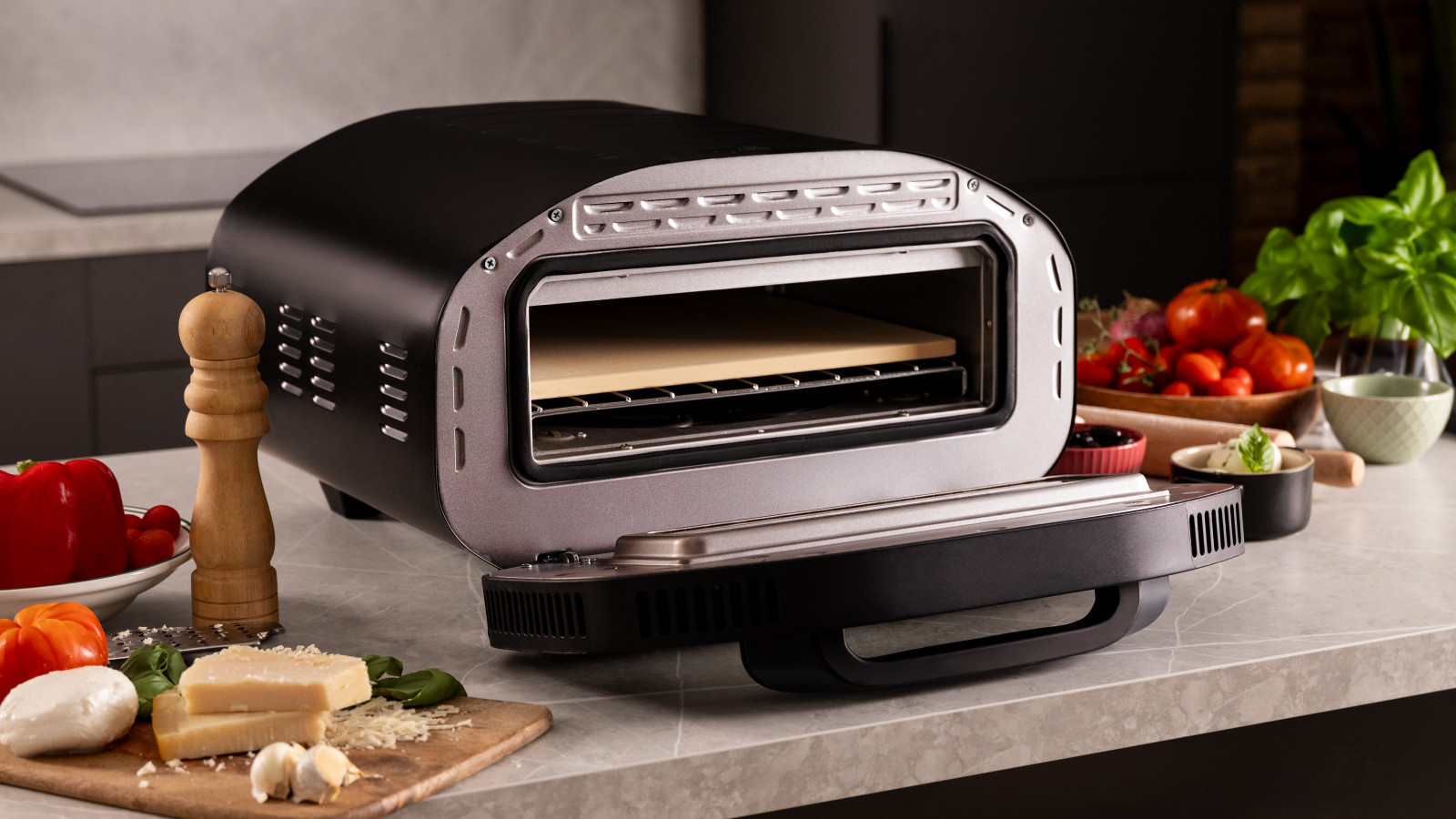 Control digital con 8 funciones: Congelada, pan-pizza, filete, chuletón, napolitana, fina y crujiente, estilo taberna y modo manual.